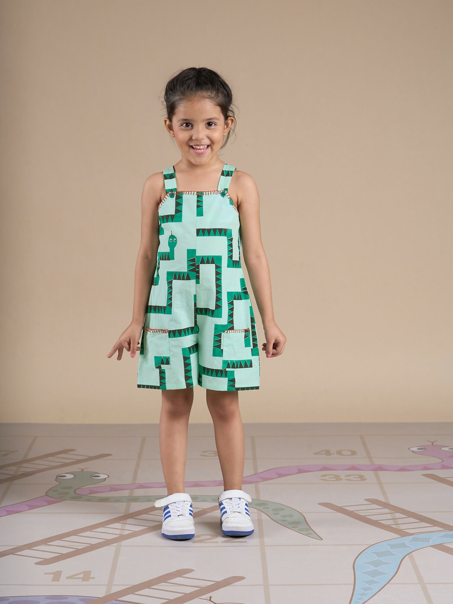 Snakes and Ladders Girls Green Table Print Jumpsuit from Siblings Collection