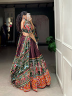Vastranavya Navaratri Special Dola Silk Patola Print With Gamthi Work and Mirror Work Lace Border - Brown