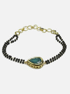 Women's Black Gold-Toned Gold-Plated Kundan Studded Charm Mangalsutra Bracelet - Ruby Raang - Distacart