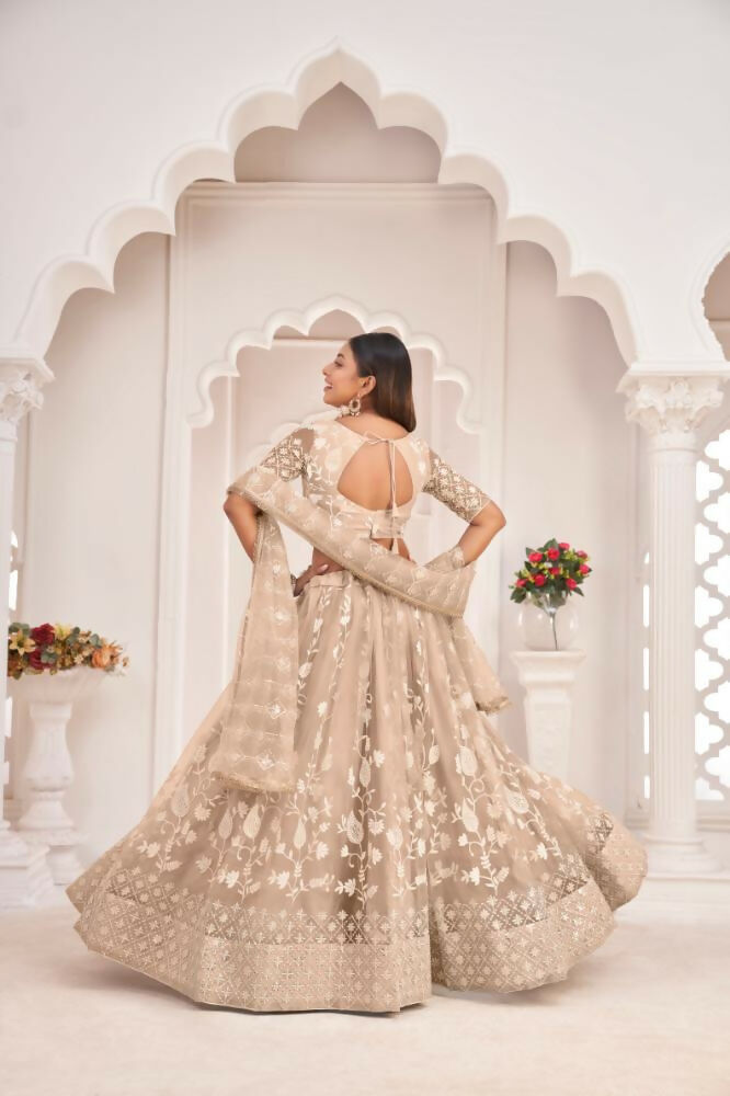 Aastha Fashion Dusty Chiku Butterfly Net White Cotton Thread Work, Zari Work And Sandwich Sequence Work Embroidery Wedding Wear Lehenga Choli