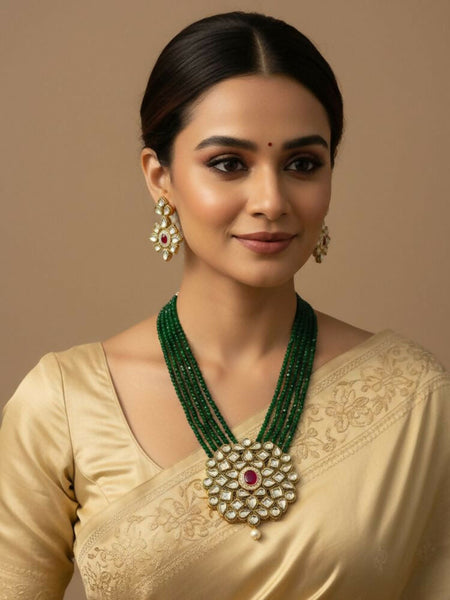 NVR Women Gold Plated Green Kundan Jewellery Set