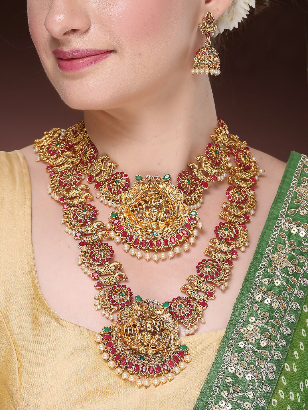NVR Women's Set of 2 Gold-Polished Green & Pink Stone Studded Peacock & Lakshmi Design Temple Jewellery Set