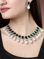 NVR Women's Silver-Plated Green American Diamond Studded Handcrafted Jewellery Set