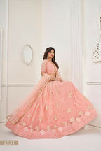 Aastha Fashion Peach Butterfly Net Tone To Tone Thread Work And Sequence Work Embroidery Wedding Wear Lehenga Choli