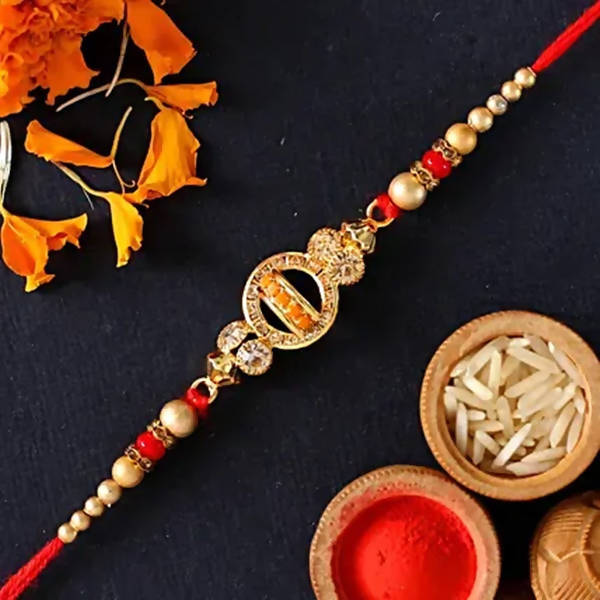 Elegant Meenakari Rakhi And Cashew Jar - Distacart