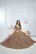 Kesar Fab Purple Net Embroidered Lehenga