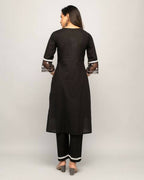 FIORRA Women's Black Cotton Straight Kurta Palazzo Set