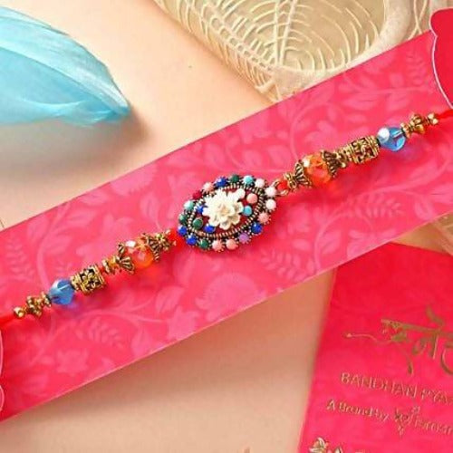 Floral Blue Beads Rakhi & Coffee Biscotti Hamper