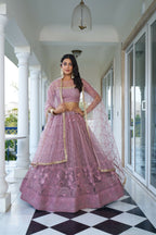 Eilara Glamorous Dusty Pink Butterfly Net With Tone To Tone Thread And Sequence Embroidered Work Lehenga Choli For Wedding