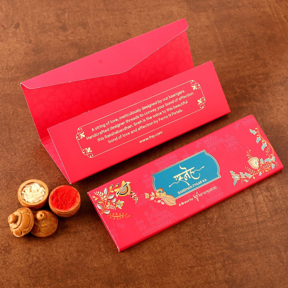 Cute Ganesha Rakhi & Silk Chocolates Online
