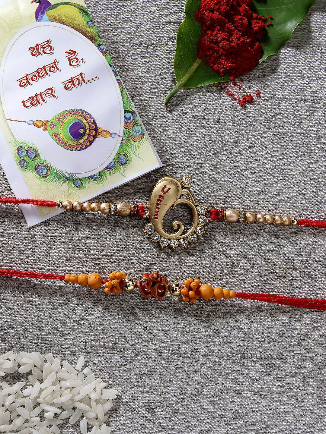 NVR Men Set of 2 Gold-Toned Ganesha Stone-Studded Rakhi With Roli Chawal & Chocolate - Distacart