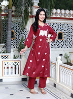 Miravan Women's Red Bandhani Printed Moti And Chikan Embroidered & Lace Work A Line Palazzo Set