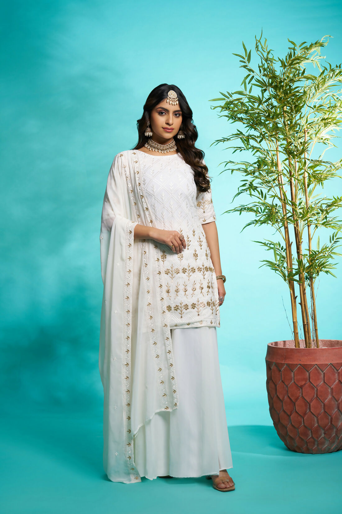 Aayaa Designer Faux Gorgette Embroidery Zari Sequins Thread work Full Flaired plazzo Suit with Dupatta - Off White