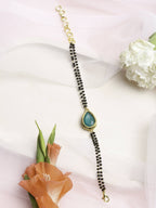 Women's Black Gold-Toned Gold-Plated Kundan Studded Charm Mangalsutra Bracelet - Ruby Raang - Distacart