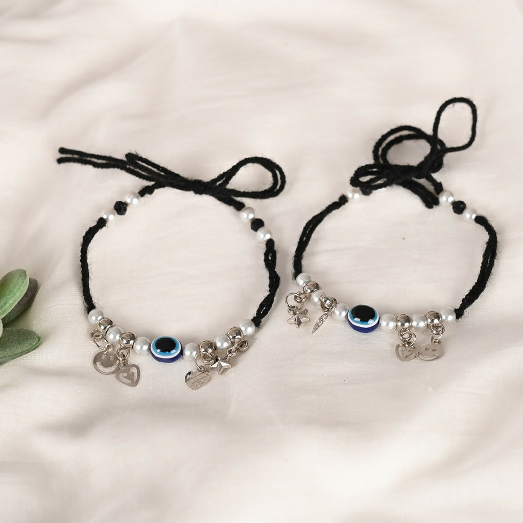 NVR Women Set of 2 Black Evil Eye Rakhi With Roli Chawal - Distacart