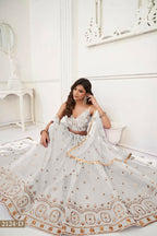 Aastha Fashion Off White Butterfly Net Tone To Tone Thread Work And Sandwich Sequence Work Embroidery Wedding Wear Lehenga Choli