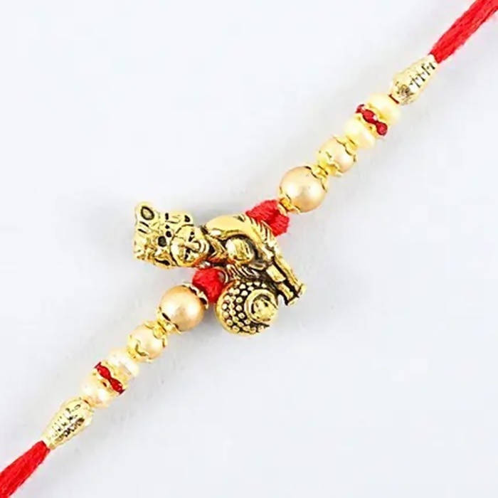 Divine Lord Krishna Pearl Rakhi & Kaju Roll Box - Distacart