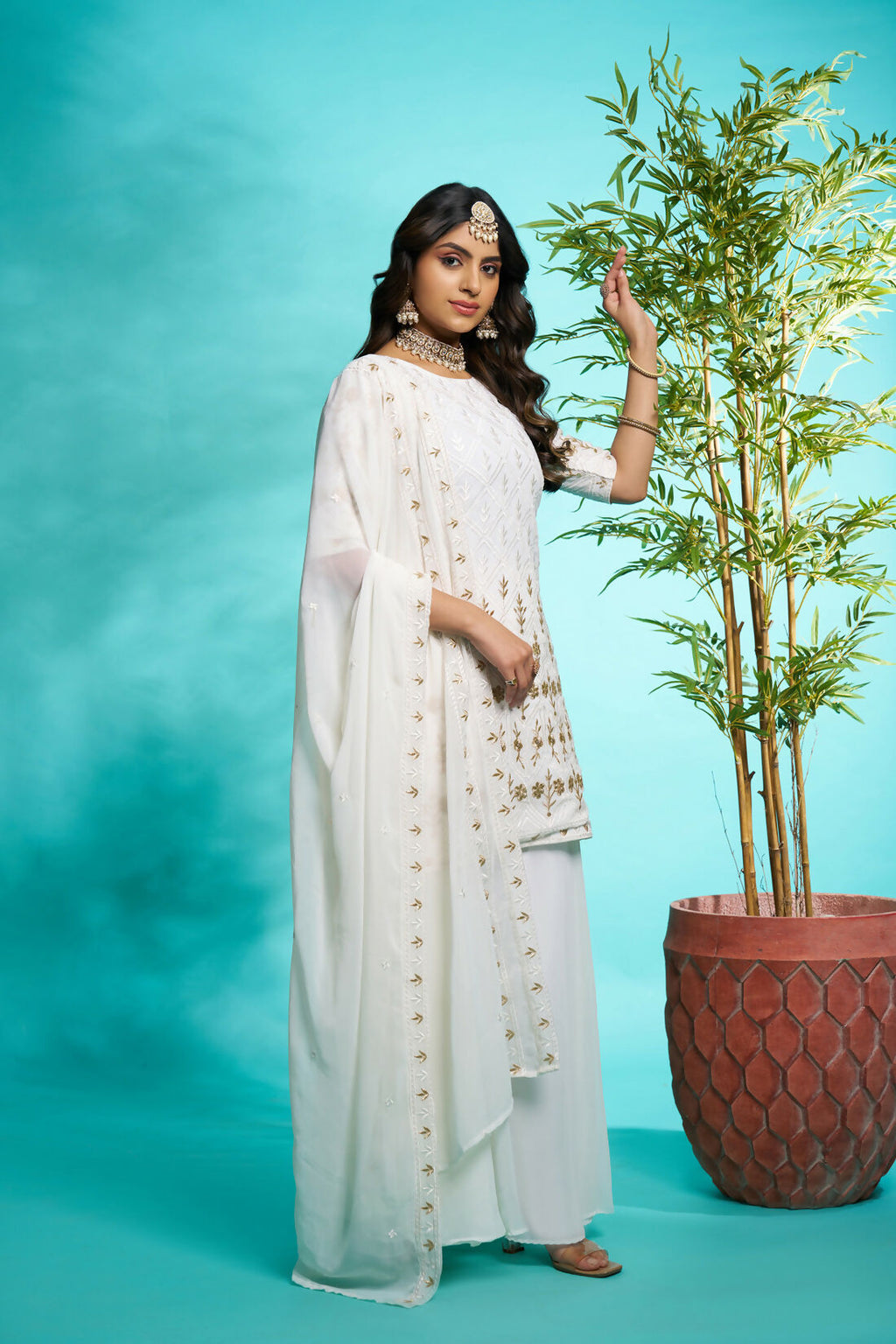 Aayaa Designer Faux Gorgette Embroidery Zari Sequins Thread work Full Flaired plazzo Suit with Dupatta - Off White