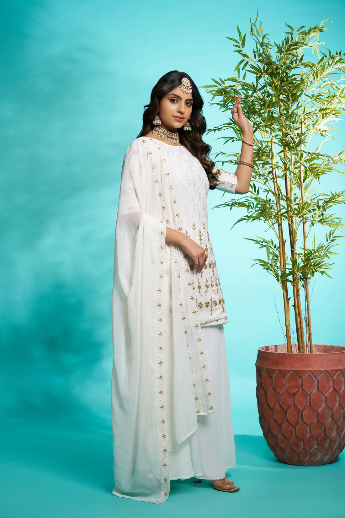 Aayaa Designer Faux Gorgette Embroidery Zari Sequins Thread work Full Flaired plazzo Suit with Dupatta - Off White