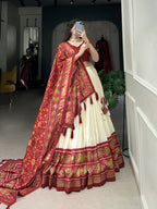 Lorenvalley Offwhite and Red Tussar Silk Patola Print Lehenga Choli