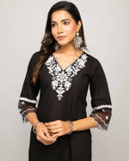 FIORRA Women's Black Cotton Straight Kurta Palazzo Set