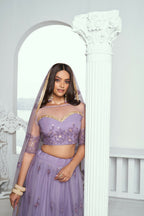 Eilara Elegance Lavender Net With Embroidered And Thread Zari Sequence Function Wear Lehenga Choli
