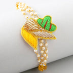 Meenakari Glimming Rakhi & Kaju Rolls Box - Distacart