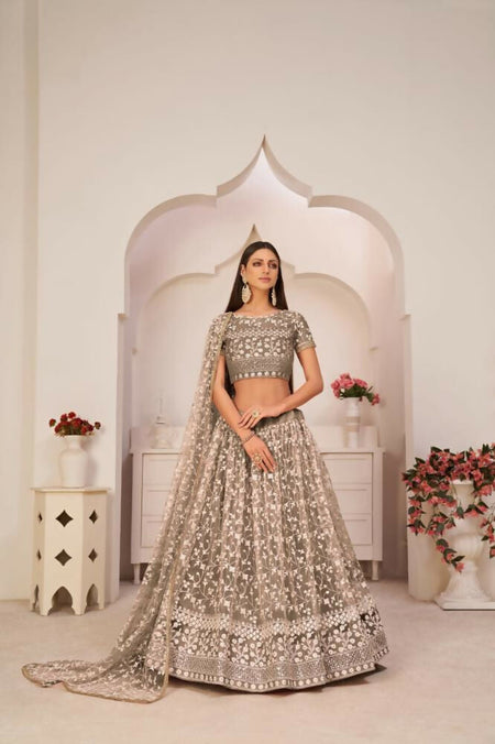 Aastha Fashion Chocolate Brown Butterfly Net White Cotton Thread Work, Zari Work And Sandwich Sequence Work Embroidery Wedding Wear Lehenga Choli
