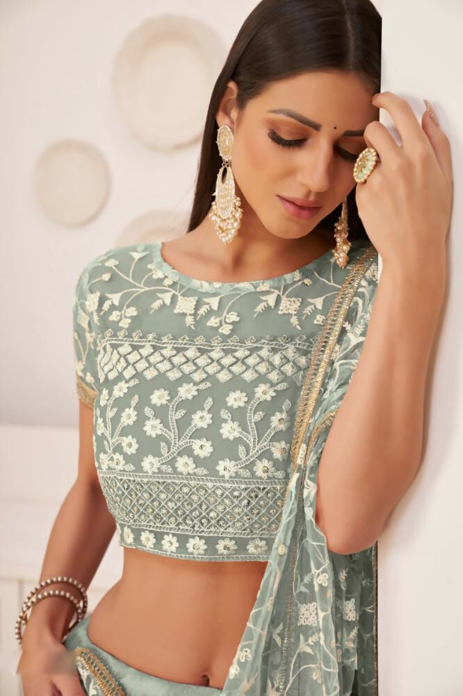 Aastha Fashion Turquoise Green Butterfly Net White Cotton Thread Work, Zari Work And Sandwich Sequence Work Embroidery Wedding Wear Lehenga Choli