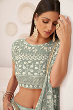 Aastha Fashion Turquoise Green Butterfly Net White Cotton Thread Work, Zari Work And Sandwich Sequence Work Embroidery Wedding Wear Lehenga Choli