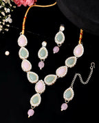 VOJ Gold-Polished Nude Pink And Mint Green Stone Studded Jewellery Set With Maang Tikka