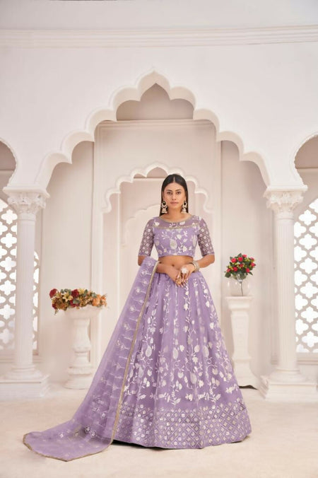 Aastha Fashion Lavender Butterfly Net White Cotton Thread Work, Zari Work And Sandwich Sequence Work Embroidery Wedding Wear Lehenga Choli