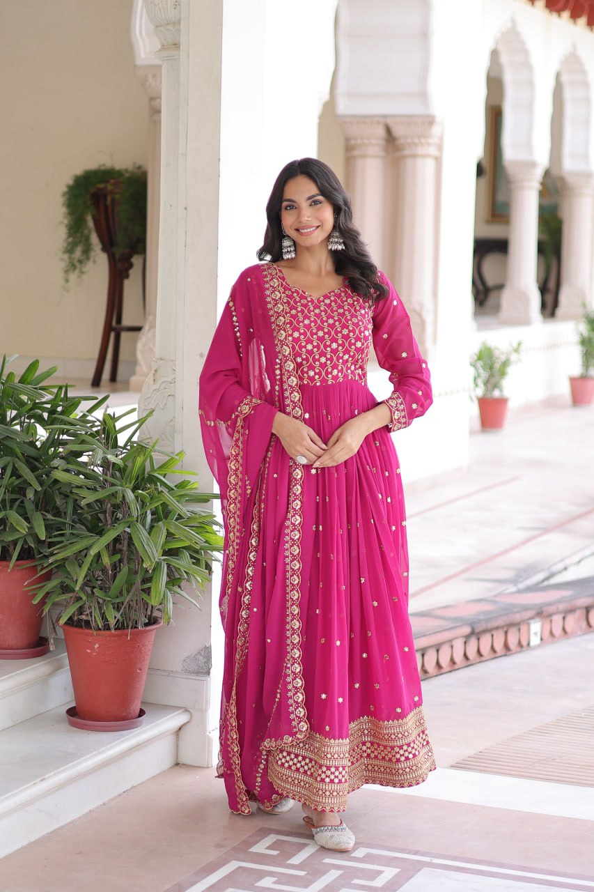 Evanik Rani Pink Faux Georgette with Rich Sequins & Zari Embroidered work Gown - Distacart