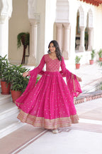 Evanik Rani Pink Faux Georgette with Rich Sequins & Zari Embroidered work Gown - Distacart