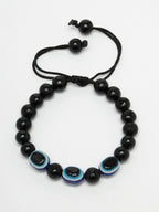 NVR Women & Men Black Evil Eye Rakhi With Roli Chawal - Distacart