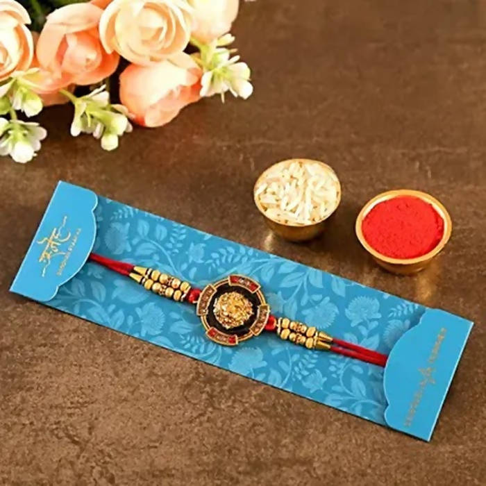 Traditional Lion Face Rakhi & Kaju Roll Box - Distacart