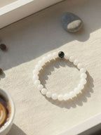 NVR Unisex White & Black Crystal Beaded Bracelet - Distacart