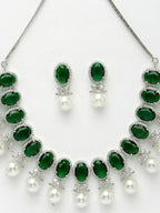NVR Women's Silver-Plated Green American Diamond Studded Handcrafted Jewellery Set
