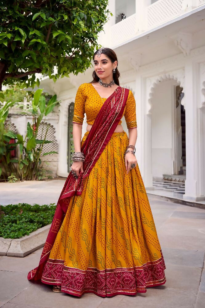 Evanik Yellow Tassa Silk With Bandhej Print Lehenga Choli - Distacart