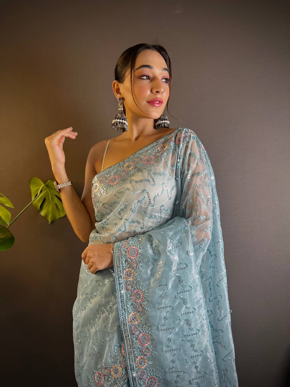 Teeya Creation Sky Color Twill Net Heavy Work Saree