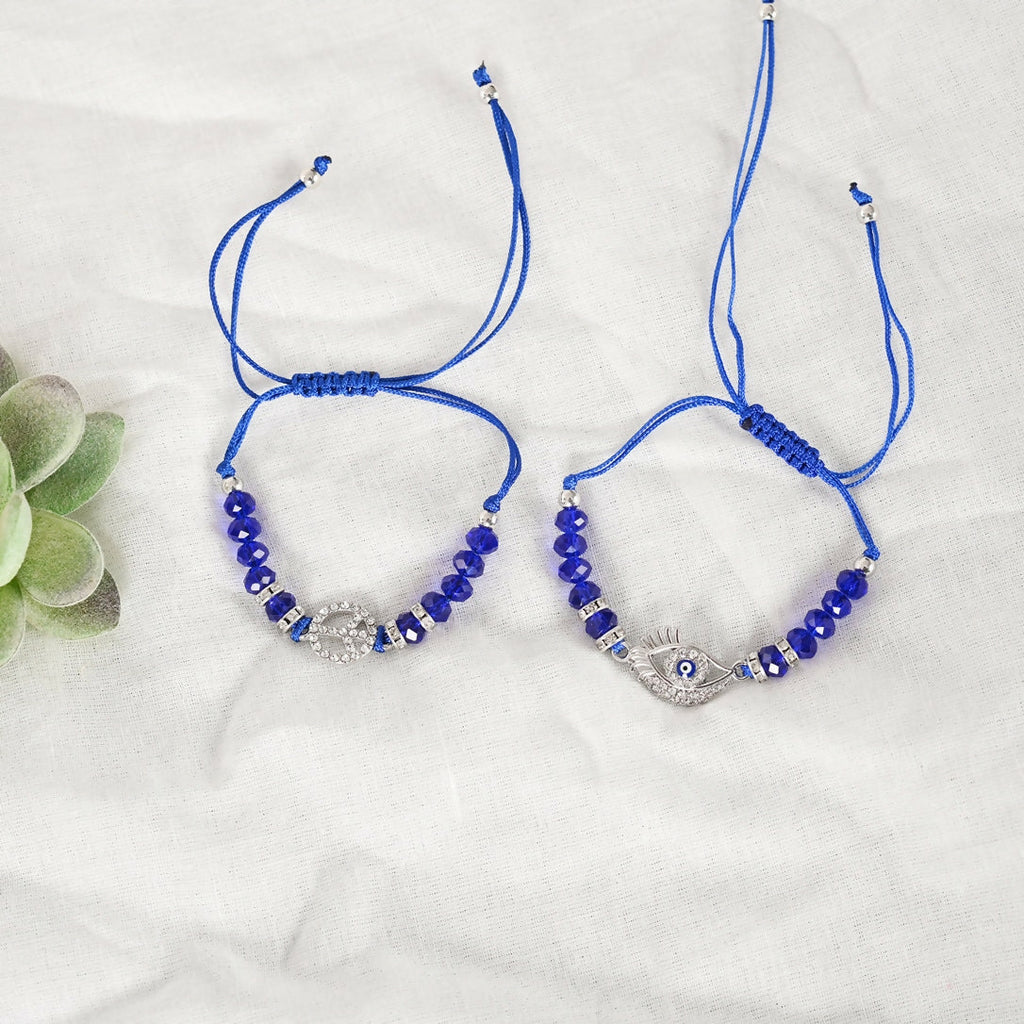 NVR Women & Men Set of 2 Blue Evil Eye Rakhi With Roli Chawal - Distacart