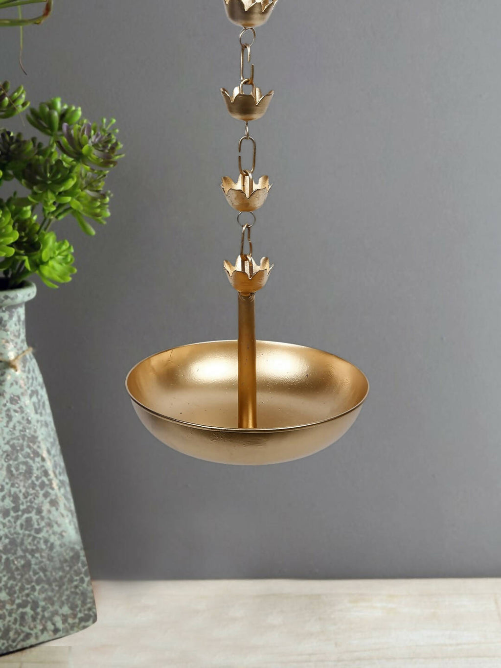 CraftVatika Gold-Toned Hanging Urli Bowl Showpiece