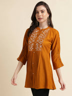 Mustard Chinon Yoke Embroidered A-line Top - Tarini