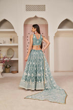 Aastha Fashion Ocean Blue Butterfly Net White Cotton Thread Work, Zari Work And Sandwich Sequence Work Embroidery Wedding Wear Lehenga Choli