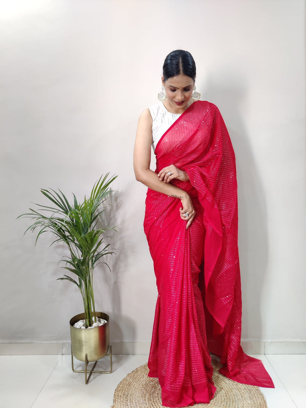 Teeya Creation Gajari Color Georgette Fabric Heavy Work Saree