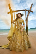 House of Panchhi Mustard Bridel Net Sequins, Moti, Mirror And Thread Embroidery Lehenga Choli & Dupatta