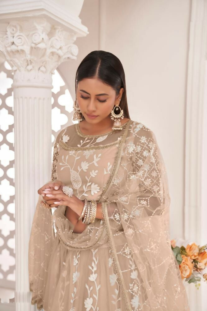 Aastha Fashion Dusty Chiku Butterfly Net White Cotton Thread Work, Zari Work And Sandwich Sequence Work Embroidery Wedding Wear Lehenga Choli