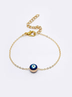 NVR Women Gold-Toned Evil Eye Rakhi With Roli Chawal - Distacart