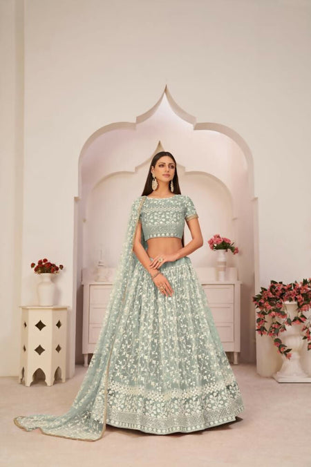 Aastha Fashion Turquoise Green Butterfly Net White Cotton Thread Work, Zari Work And Sandwich Sequence Work Embroidery Wedding Wear Lehenga Choli