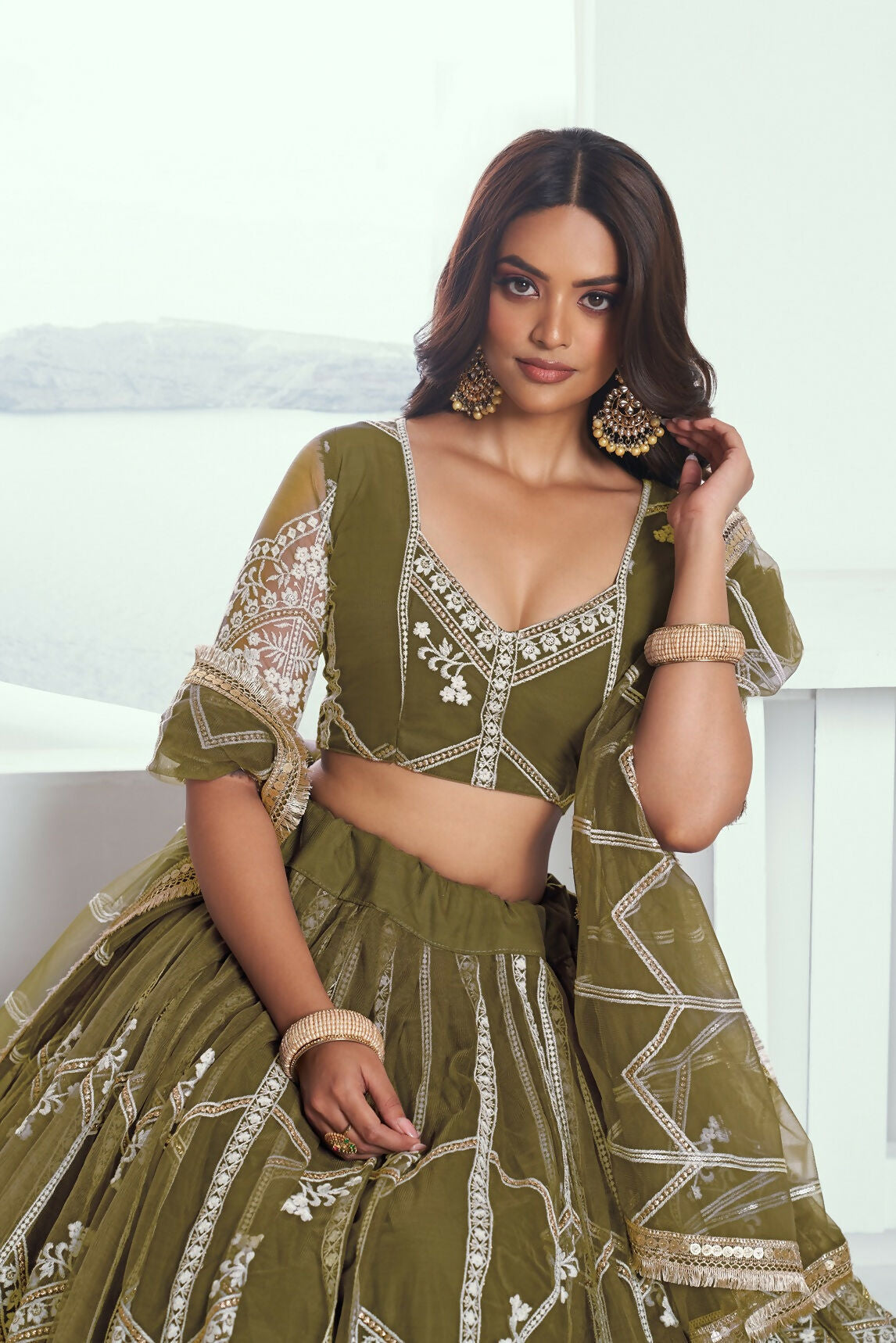 Eilara Adorable Olive Green Sequins Net Mehendi Wear Lehenga Choli